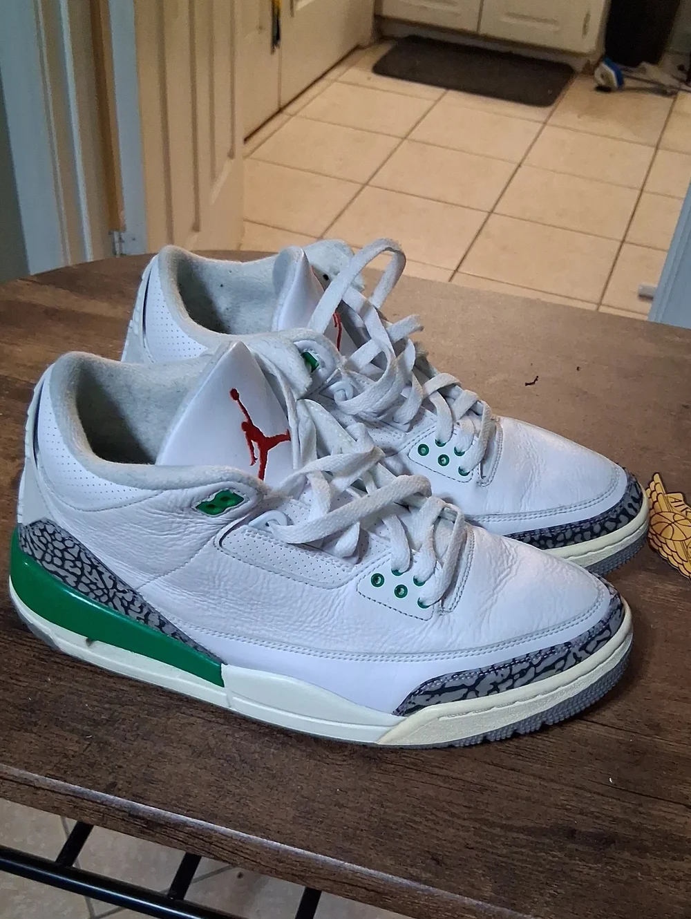 Jordan White Leather Athletic Sneakers with Green and Red Accents